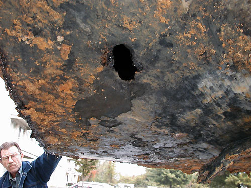Photo of hole in underground storage tank