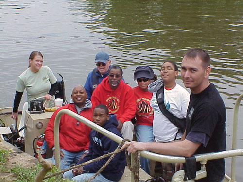 Green Shirt- Sarah Harvey from MDE Annapolis Office, Blue Jacket Noah Bierman MDE Annapolis office, Red shirts and black shirt, volunteers from local school.