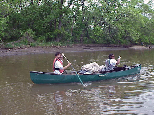 Local Volunteers help cleanup the Anacostia River.