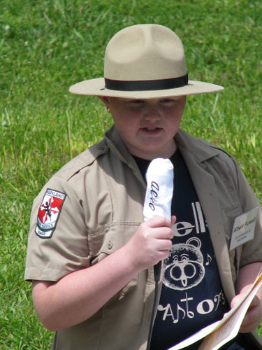 Crellin Elementary student Luke Riley portrays Albert Powell, the Md. Department of Natural Resources fisheries biologist and former fish hatchery director, describing conditions in western Maryland streams in the mid-20th century.